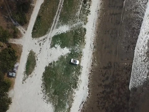 Car on the beach Stock Footage 80794591