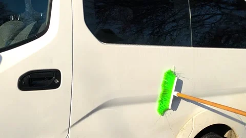 Car being washed with brush and water on sunny day in outdoor setting, Stock Footage 339419466