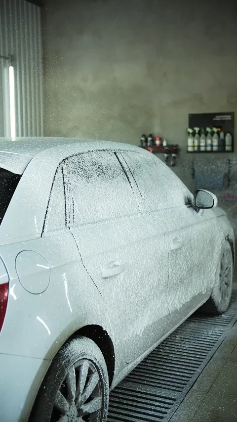 Car being washed with foam spray Stock Footage 289540294