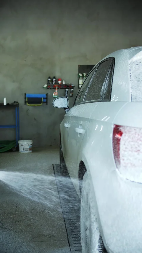 Car being washed with foam spray Stock Footage 289540342
