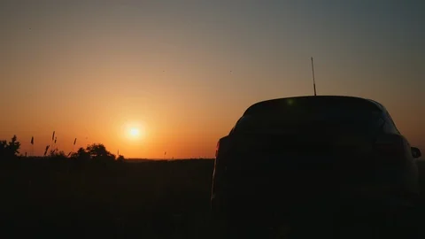 The car blinks emergency lights at sunset Stock Footage 110734331