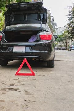 Car breakdown with warning triangle on road 스톡 사진