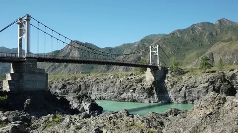 Car on the bridge over Katun river in Altay. Stock Footage 69777619