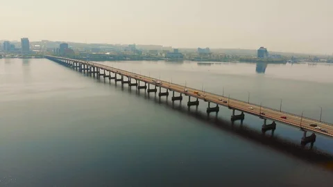 Car bridge through the river. View from air. Video stock 107273638