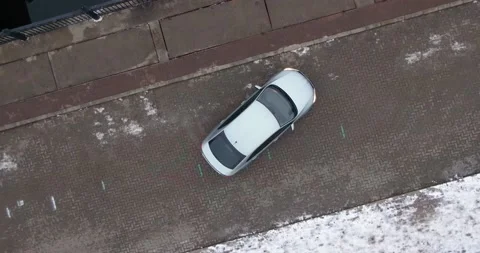 The car is on the bridge. Waterfall. Nice view of the car from the air. Video stock 144875991