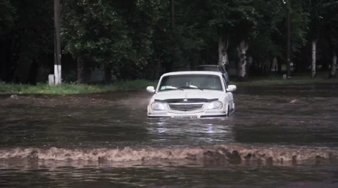Car Broke Down Through Flooded Road Stock Footage