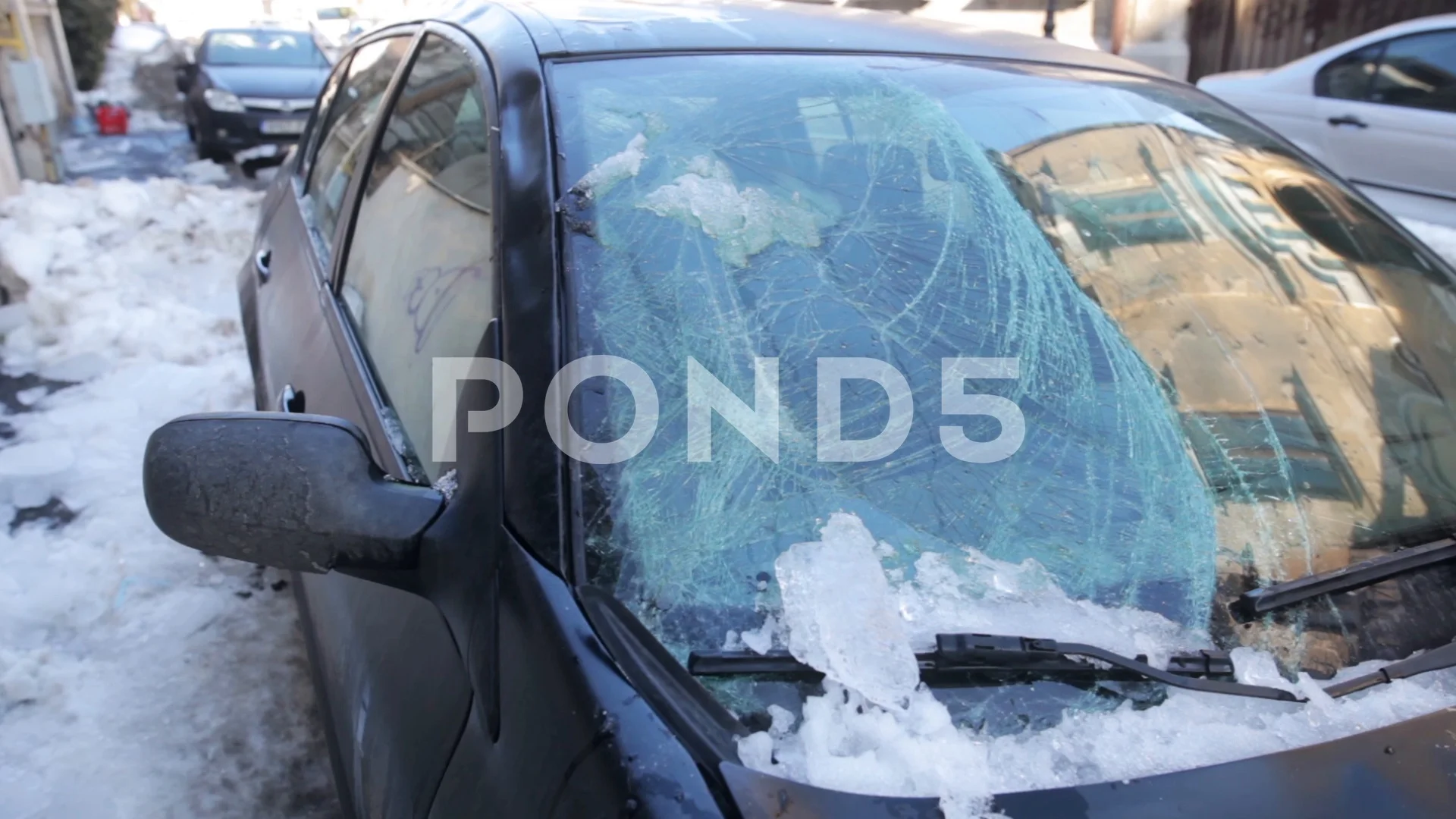 Close up footage of a car windshield, frost on the windshield of