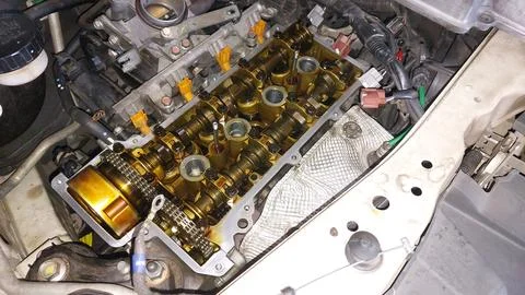 Car bumper, engine, and filter service with component exposure Stock Photos