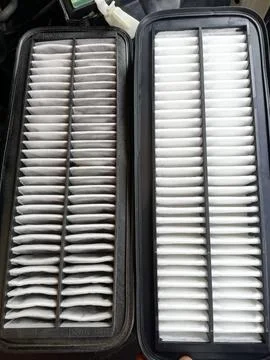 Car bumper, engine, and filter service with component exposure Stock Photos