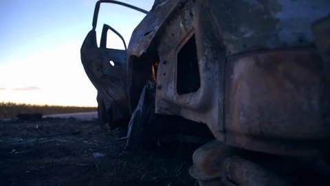 The car burned down after the accident. Consequences of car accident. Damaged by Stockbeeldmateriaal 115039025
