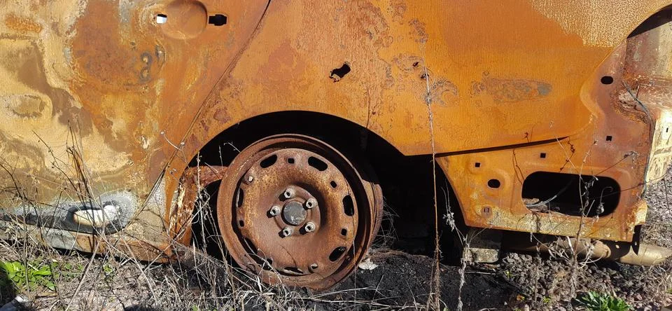 The car burned as a result of artillery fire. Mykolaiv. Ukraine. Stock Photos
