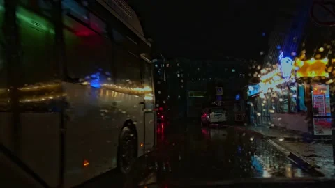 Car, Bus windshield flooded by rain. Night sky. Stock Footage 165275899