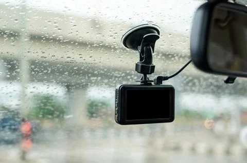 Car camera installed on a windshield. Stock Photos
