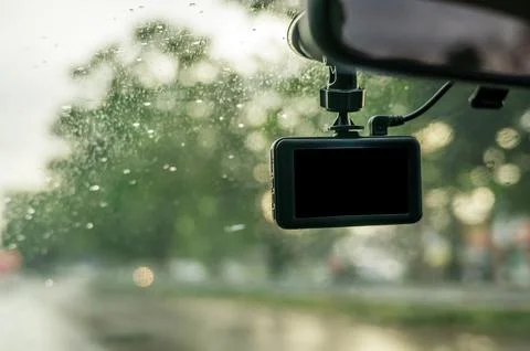Car camera installed on a windshield. Stock Photos
