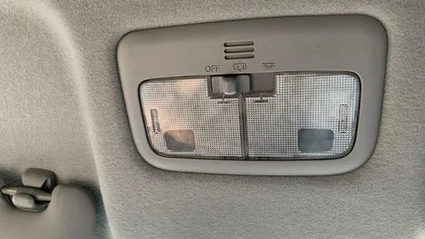 Car ceiling dome light with dual switches Stock Photos