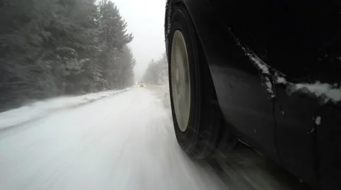 Car chase on snow mountain road, 4k Stock Footage 59107305