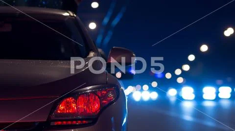 The car on the city road. Evening night time Stock Photos