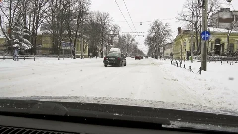 Car on city winter road Stock Footage 87641883