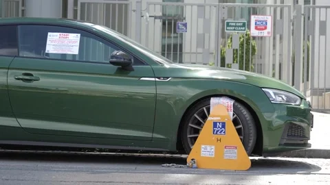 Car clamped Stock Footage 154299804