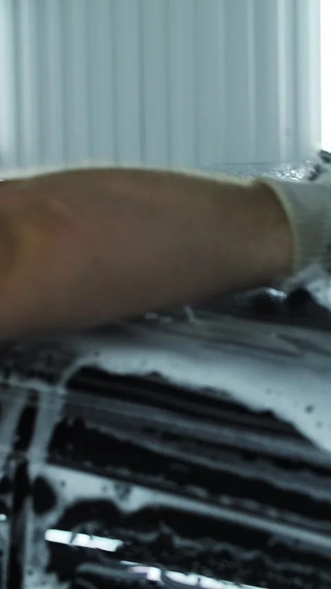 Car cleaning with a soapy sponge Stock Footage 296020163