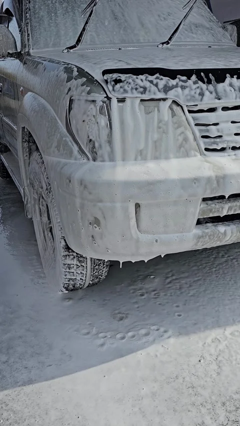 Car Cleaning using active foam, vertical mobile video. Stock Footage 292773789