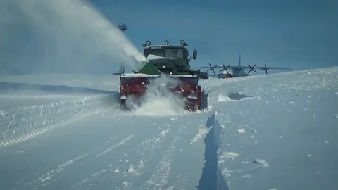 The car clears the road from snow Video stock 127214250