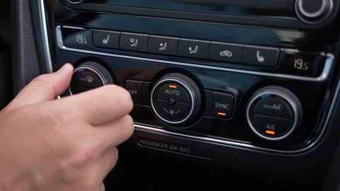 Car Climate Control Adjustment Close Up Driver Hand Using AC Panel Stock Footage 343157016