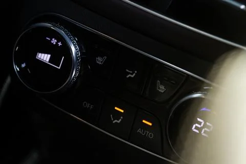 Car climate control button. Modern car heating control panel. Stock Photos