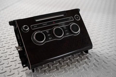 Car climate control panel isolated on white background Foto stock
