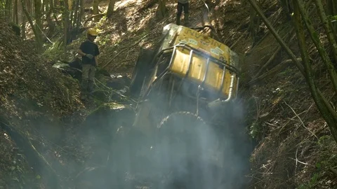 Car climbing a slope in the forest Stock Footage 100865252