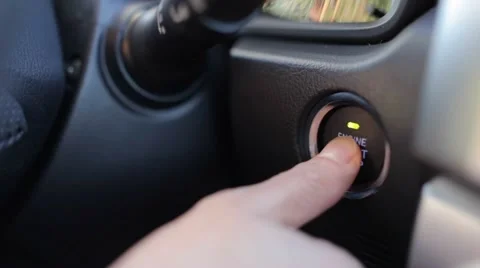 Car. Close up of hand pressing engine button. Person starting engine Stock Footage