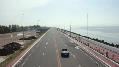 Car in coastal road 動画素材 250970506