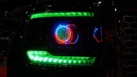 A car with color changing headlights Stock Footage 103824443
