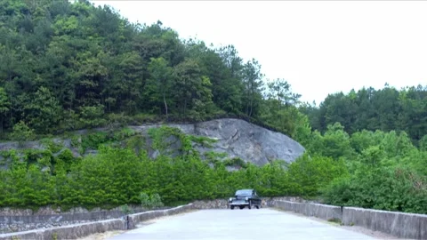 Car coming from afar Stock Footage 235267652