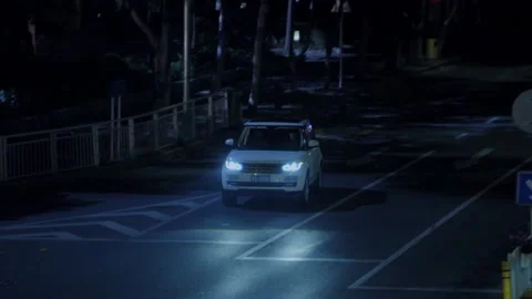 Car coming out of the intersection Stock Footage 235276430