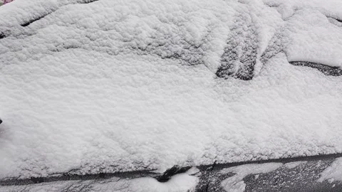 Car completely covered in deep snow after a heavy winter blizzard.  Stock Footage 326135749