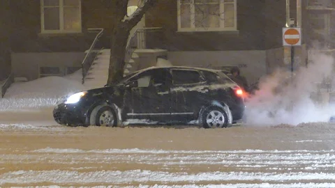 Car completly stuck in the snow Stock Footage 105179757