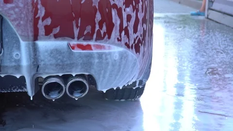 Car covered with foam. Stock Footage 93804588