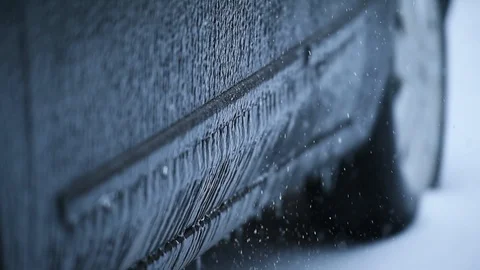 Car covered in ice during freezing rain phenomenon 스톡 동영상 87324474