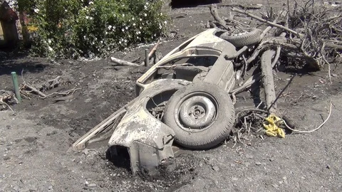 Car covered with mud after devastating landslide. Landslide and soil erosion Stock Footage 105161849