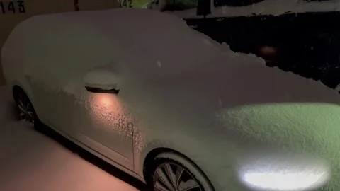 The car is covered with snow Stock Footage 168651832