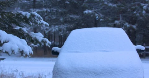 Car Covered in Snow from an Overnight Snowfall Stock Footage 100797883