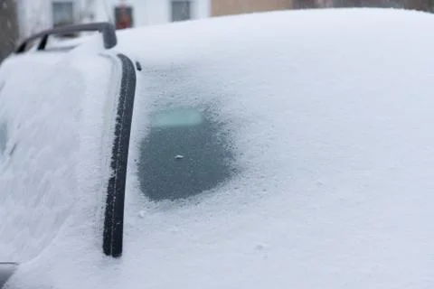 Car covered with snow Stock Photos