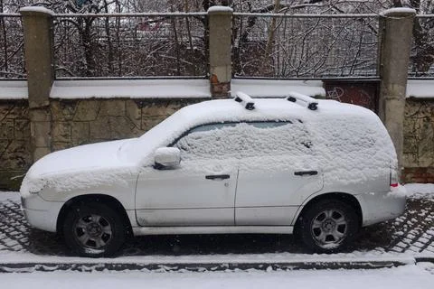 Car covered by snow Stock Photos