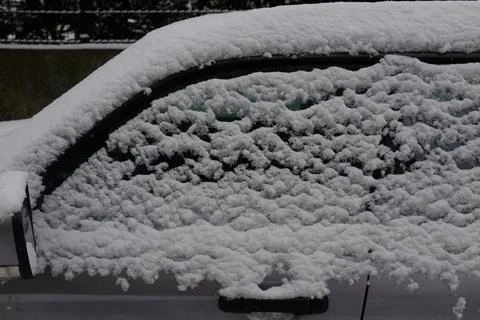 Car covered by snow Stock Photos