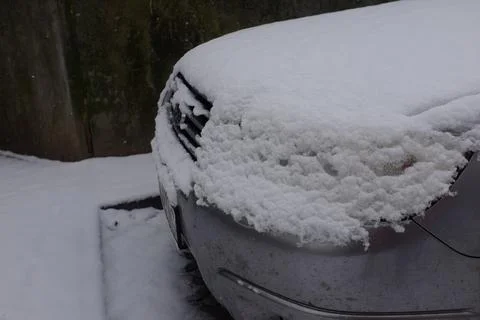 Car covered by snow Stock Photos