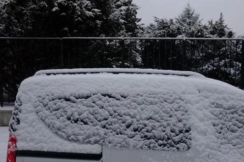 Car covered by snow Stock Photos