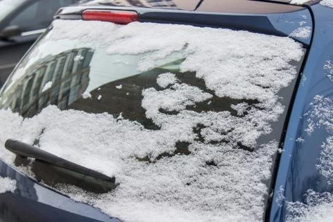 The car, covered with thick layer of snow. Stock Photos