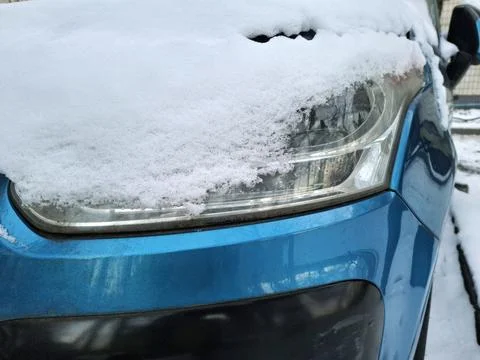 Car covered in white snow 스톡 사진