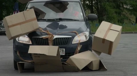 Car crashes into a wall of boxes Video stock 8949652